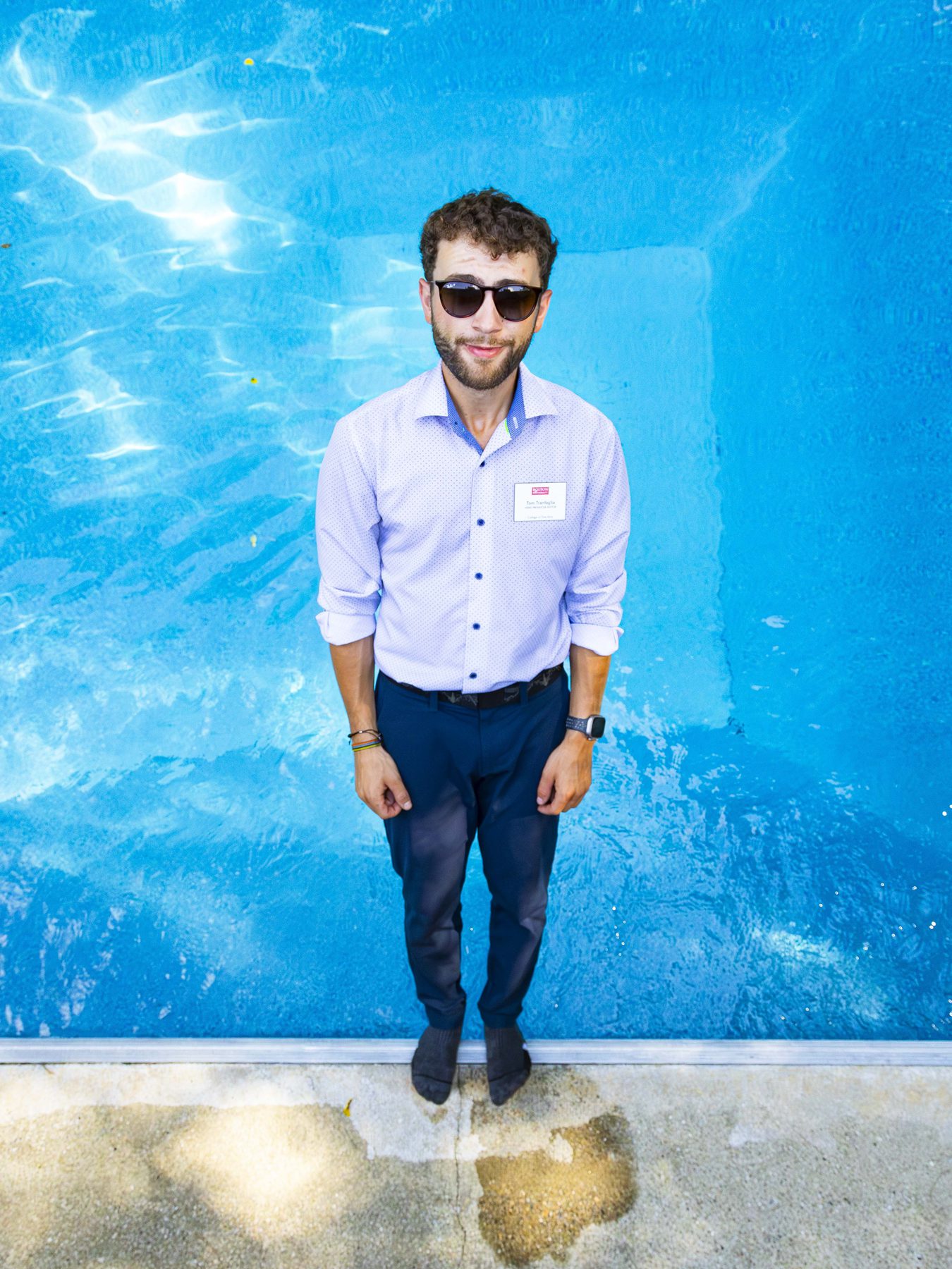 Tom Tranfaglia standing poolside